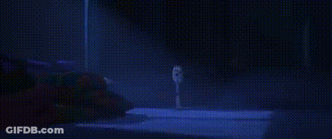 Blurry Person In Dark Room With Blue Light GIF