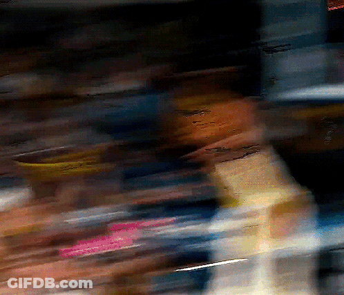 Blurry Person In Dark Room With I Love You Sign GIF
