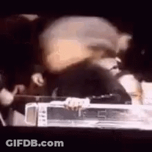 Blurry Person In Front Of Microwave Oven GIF