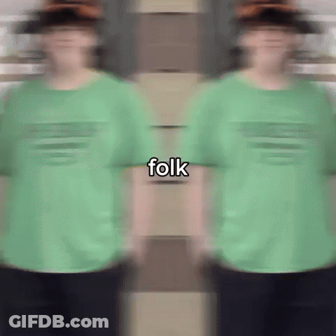 Blurry Person In Green Folk Shirt GIF