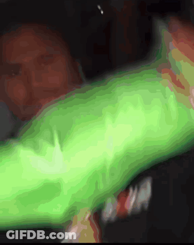 Blurry Person In Green Shirt Saying A GIF