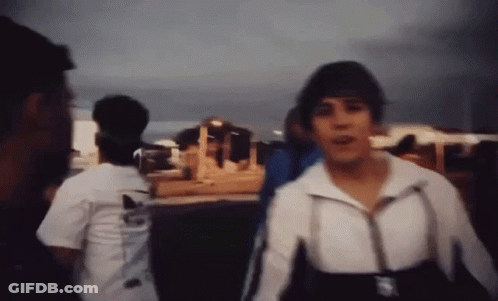 Blurry Person In White Jacket With Adidas GIF