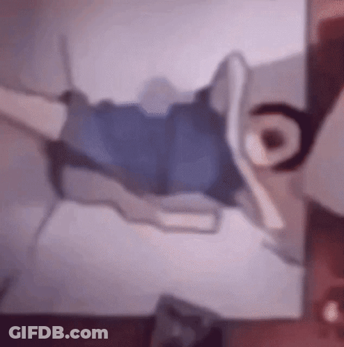 Blurry Person Laying On Bed GIF