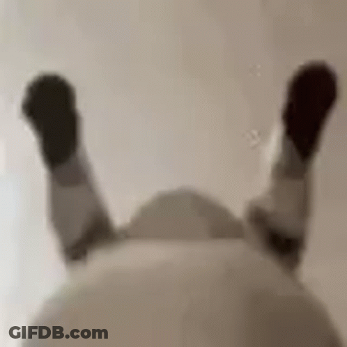 Blurry Person Lying Back Legs Up GIF