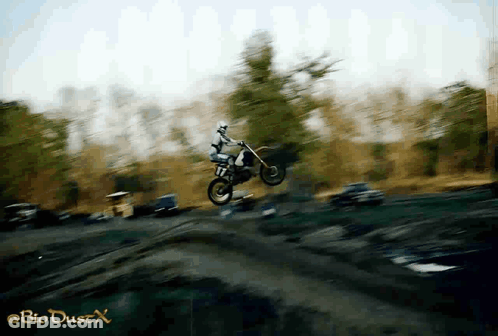 Blurry Person On Dirt Bike Bio Dust X GIF