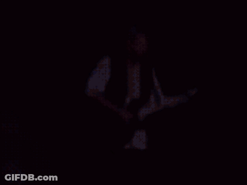 Blurry Person Playing Guitar GIF