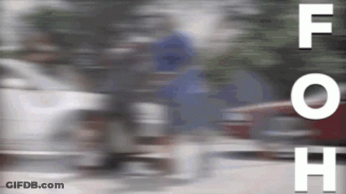 Blurry Person Riding Bike With F O H Visible GIF