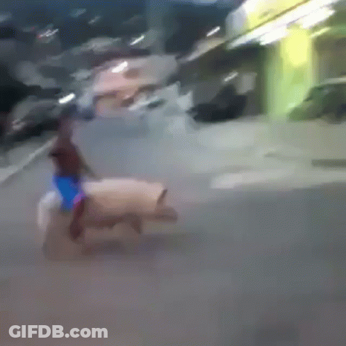 Blurry Person Riding Horse Down Street GIF