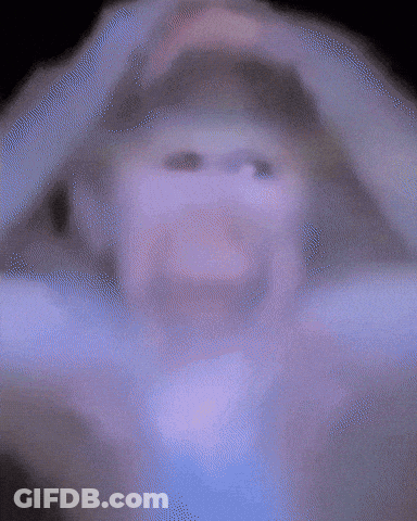 Blurry Person's Face Purple Background GIF