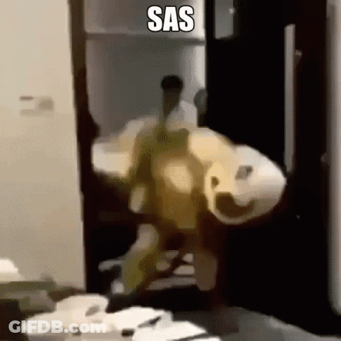 Blurry Person Standing In Room With SAS GIF