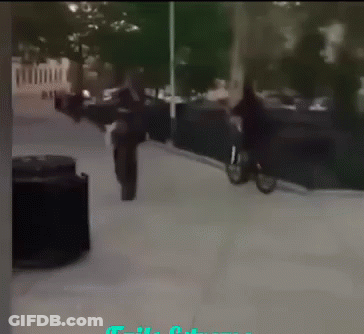 Blurry Person Walking Down Sidewalk A Few Steps GIF