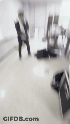 Blurry Person Walking In Room GIF