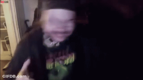 Blurry Person Wearing Freak Out Shirt GIF