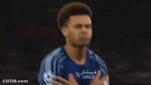 Blurry Person Wearing Sirdlv Shirt GIF