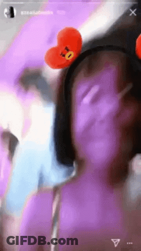 Blurry Person With Heart Headband GIF