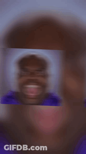 Blurry Person With Hearts Around Them GIF