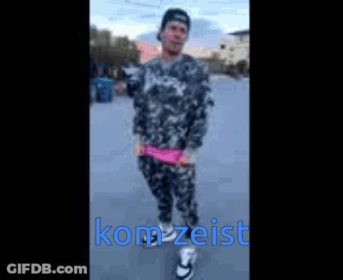 Blurry Person With Kom Zeist In Blue Letters GIF