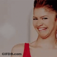 Blurry Photo Of Man And Woman Saying Tom And Harrison GIF