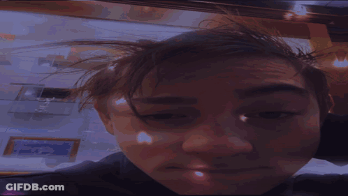 Blurry Photo Of Person's Face GIF