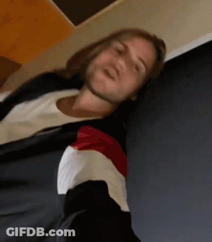 Blurry Picture Of Man With Long Hair GIF