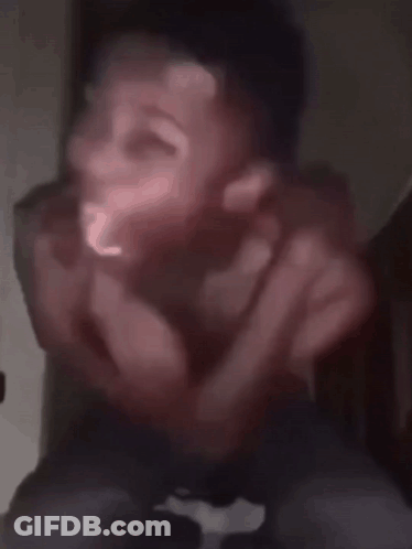 Blurry Picture Of Shirtless Man Making Funny Face GIF