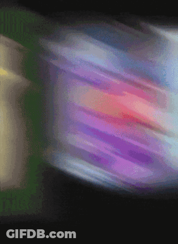 Blurry Purple Pink And Blue Object On Black GIF