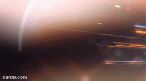 Blurry Rainbow In The Dark GIF