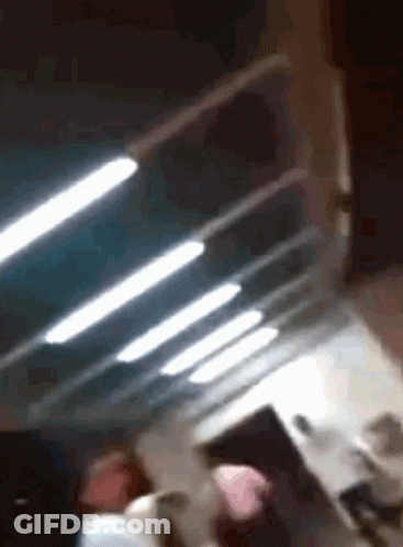 Blurry Room With Ceiling Lights GIF