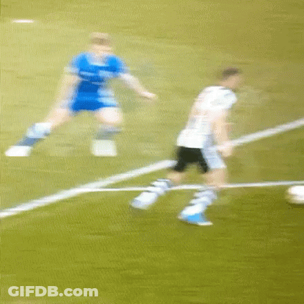 Blurry Soccer Game Player In Blue Shirt GIF