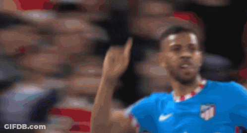 Blurry Soccer Player In Blue Jersey GIF