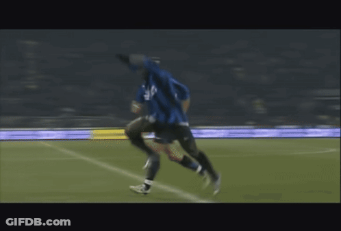 Blurry Soccer Player In Blue Jersey With P GIF