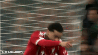 Blurry Soccer Player In Red Liverpool Jersey GIF