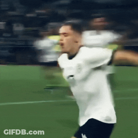 Blurry Soccer Player In White Shirt GIF