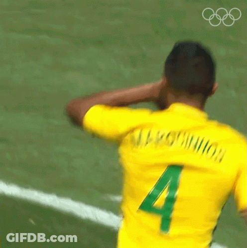 Blurry Soccer Player In Yellow Jersey Number 4 GIF