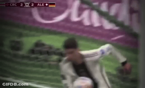 Blurry Soccer Player Kicking Ball GIF