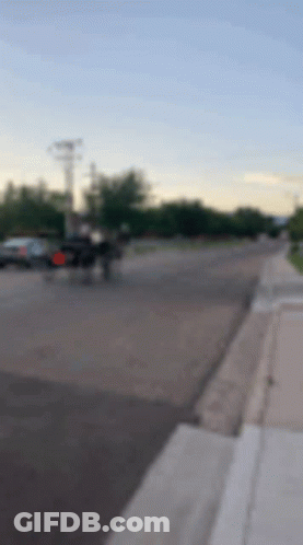 Blurry Street With Car Driving GIF