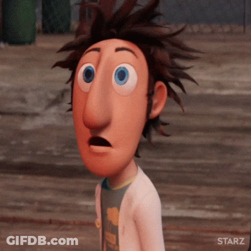 Blurry Street With Cars And Buildings GIF