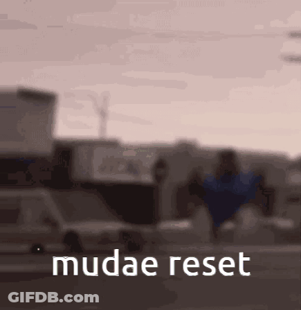 Blurry Street With Mudae Reset Text GIF