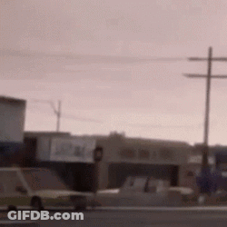 Blurry Street With Parked Cars GIF