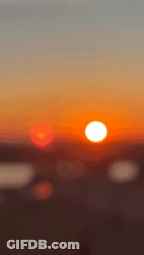 Blurry Sunset With Sun In Center GIF