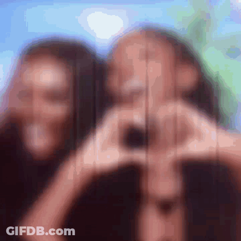 Blurry Two Women Making Heart GIF
