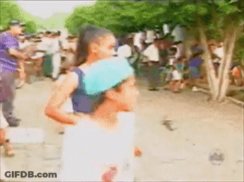 Blurry Woman Carrying Child On Back GIF