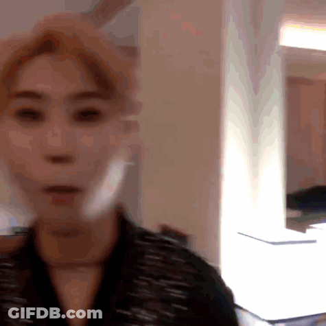Blurry Woman Face With Light Behind GIF