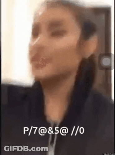 Blurry Woman Face With P 7 @ & 5 @ / 0 GIF