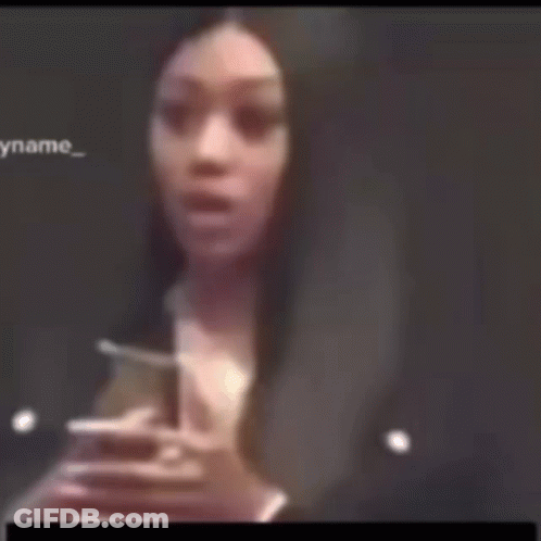 Blurry Woman Holding Hands To Face GIF