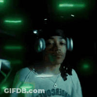 Blurry Woman In White Hat Dancing In Dark GIF