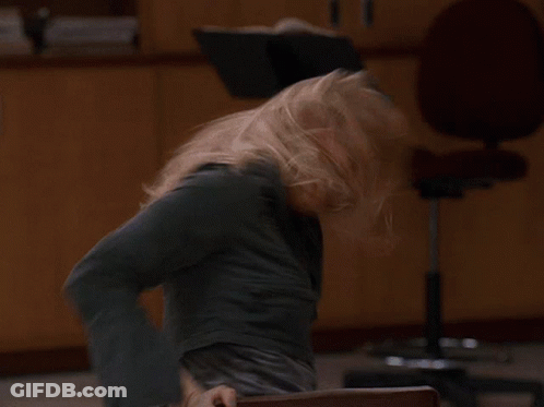 Blurry Woman Sitting In Office Chair GIF