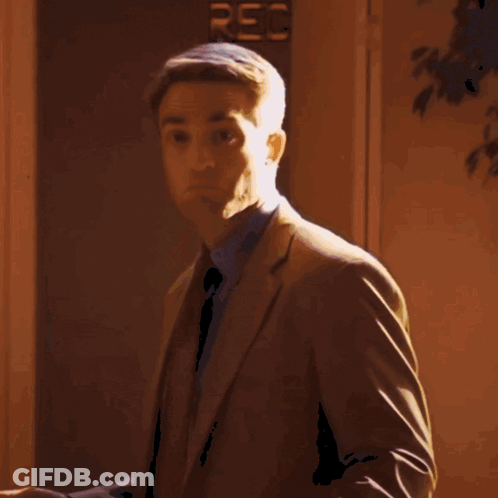 Blurry Woman Standing In Front Of Window GIF