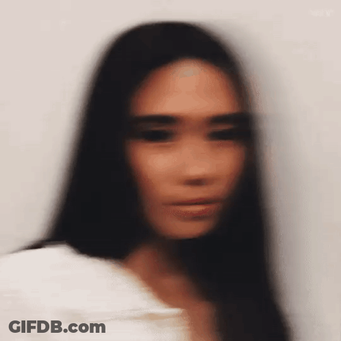 Blurry Woman With Long Dark Hair GIF