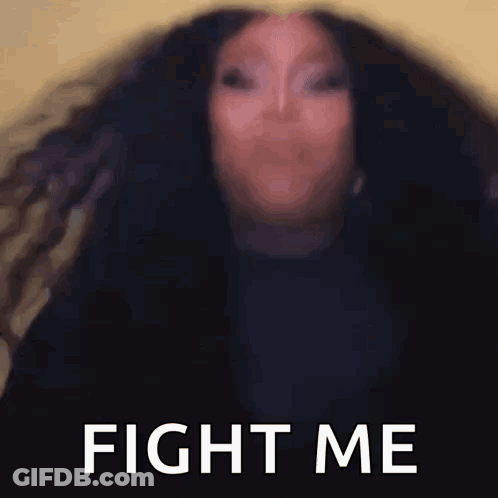 Blurry Woman With Long Hair Saying Fight Me GIF